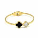 Gold clover bracelet for women with black and pearl clover design on adjustable gold bangle