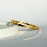 gold screw bangle bracelet luxury minimalist design